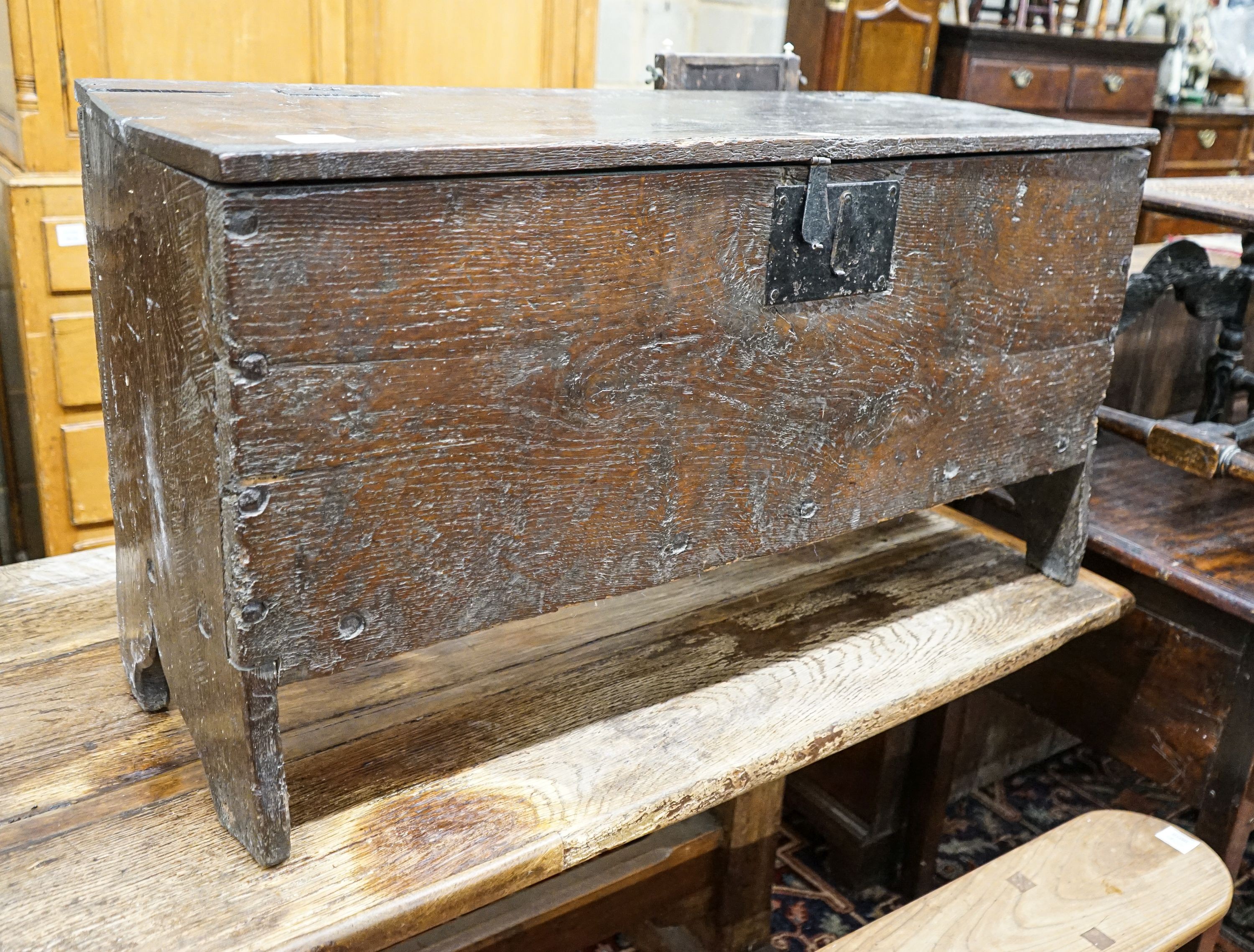 A 17th century oak and elm six plank coffer, width 104cm, depth 36cm, height 54cm